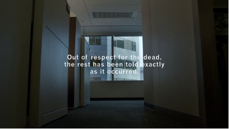 The seemingly empty interior of an office, shot from an angle close to the floor. Text reads: